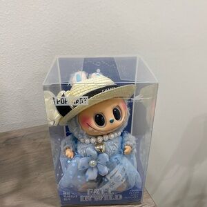 Adorable Doll with Blue Dress and Hat